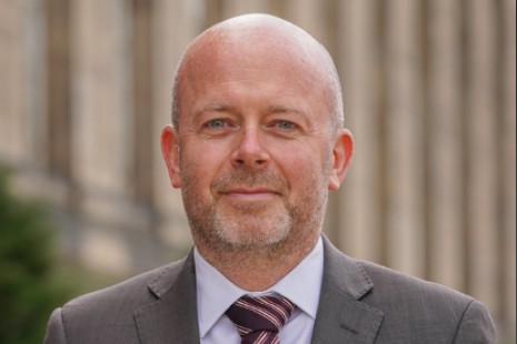 A headshot of Joe Griffin ​
